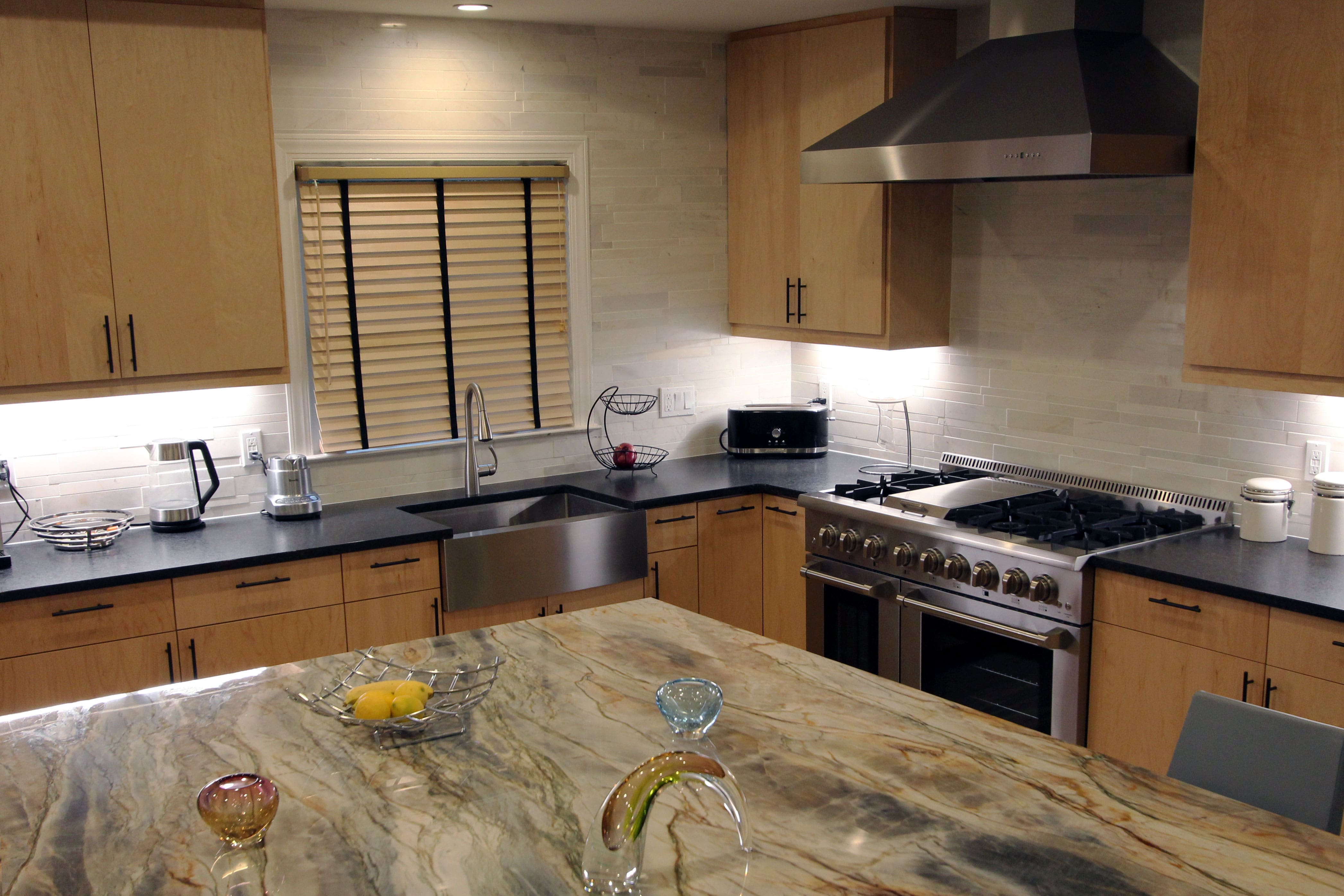 Norstone White Marble Lynia Interlocking Tile Backsplash in modern styled kitchen
